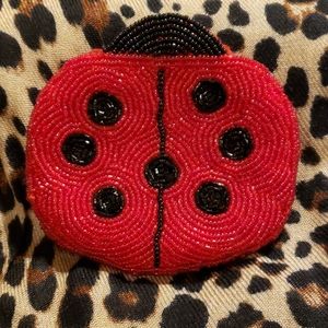 Lady Bug beaded coin purse.